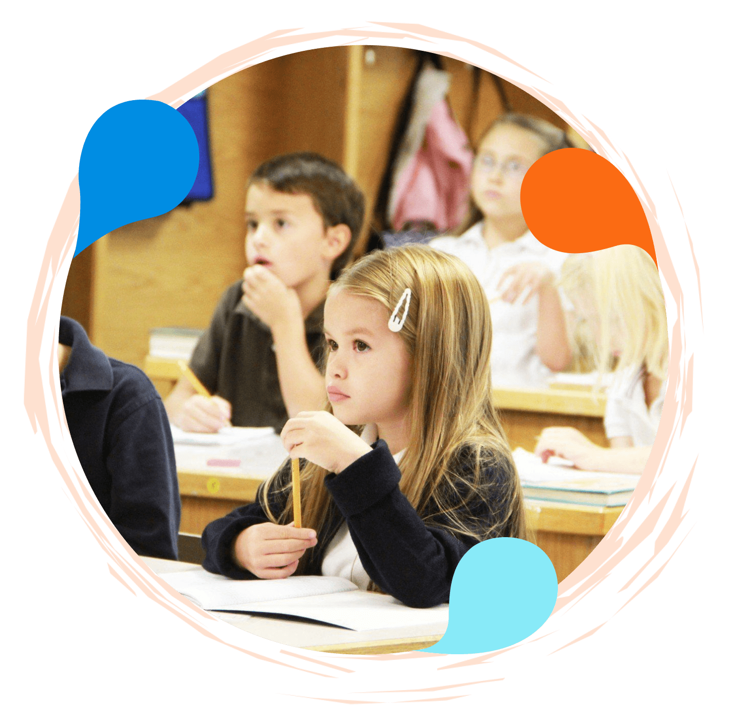 A group of children sitting at desks in front of papers.