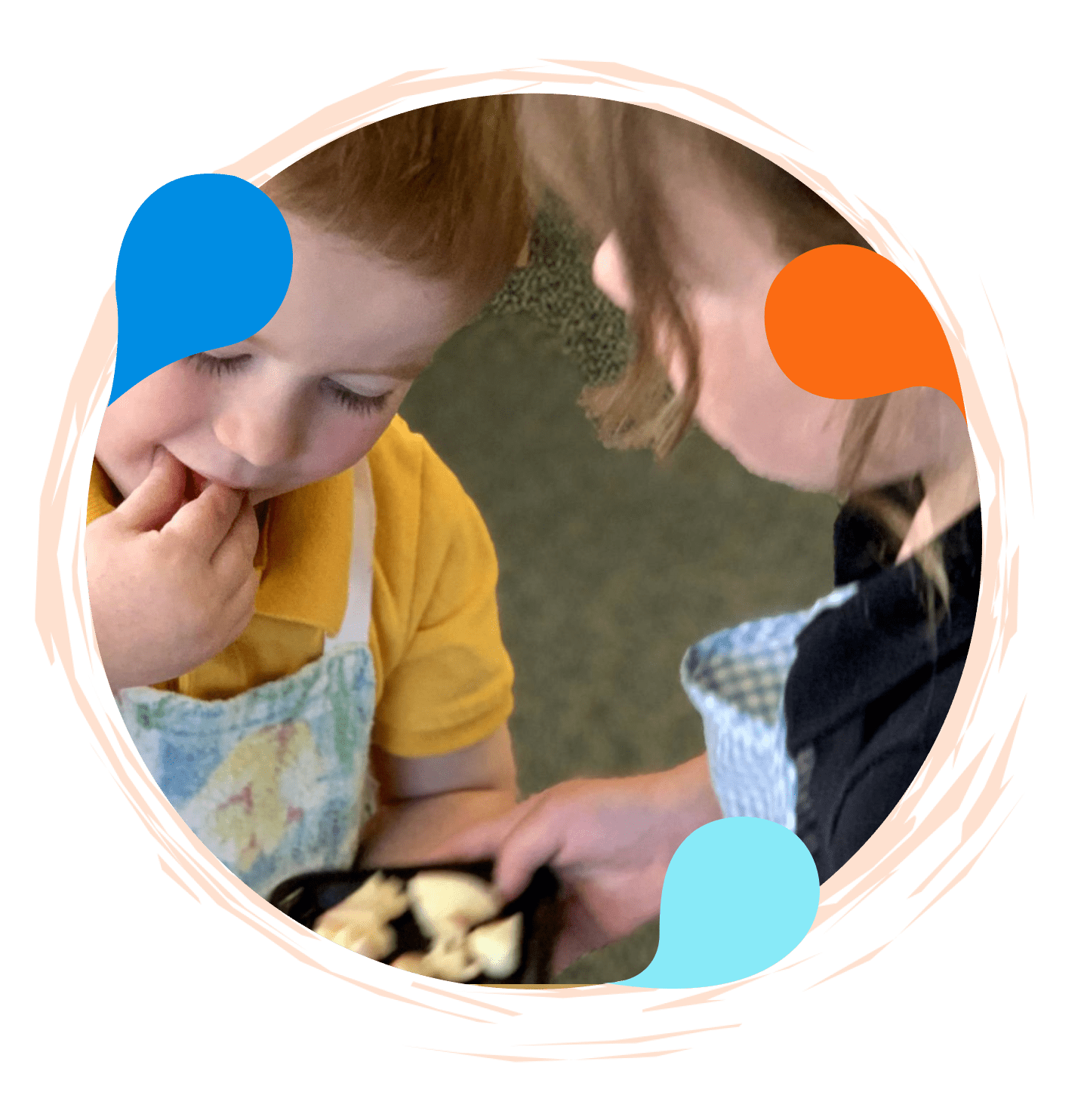 A child and an adult looking at bananas.